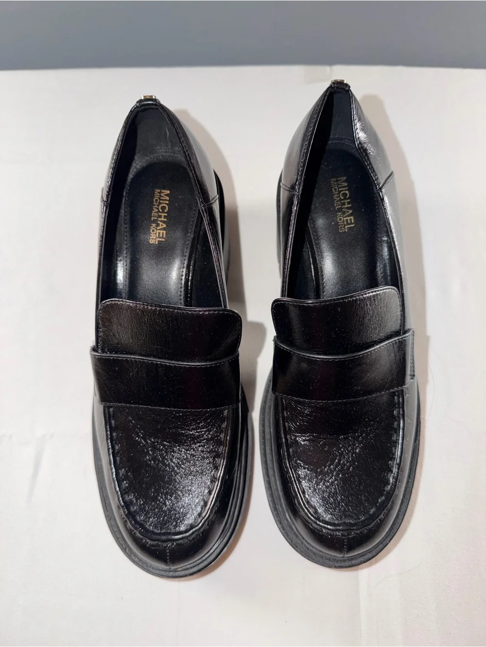 Michael Kors Black Leather Rocco loafers with a chunky block heel and penny slot